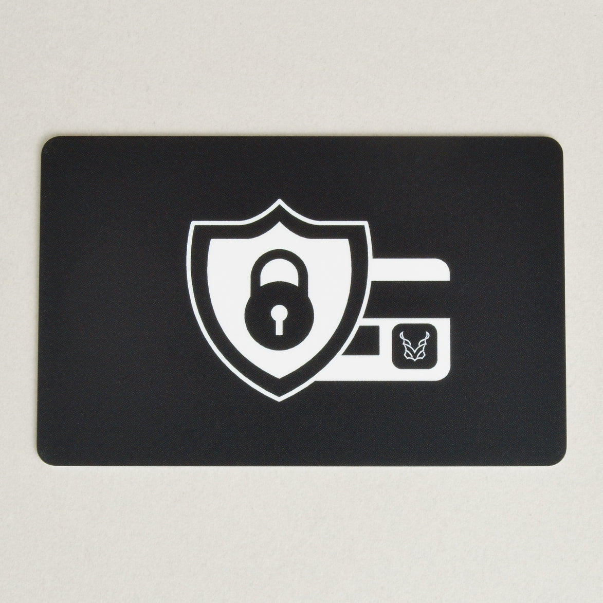 Black RFID block card with a white security shield, lock icon and markore logo.