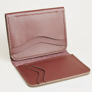 Inside view of espresso brown full-grain leather flap fold wallet featuring a flap closure, vertical and horizontal card slots and handmade stitching. Markore Khaas Andaz.