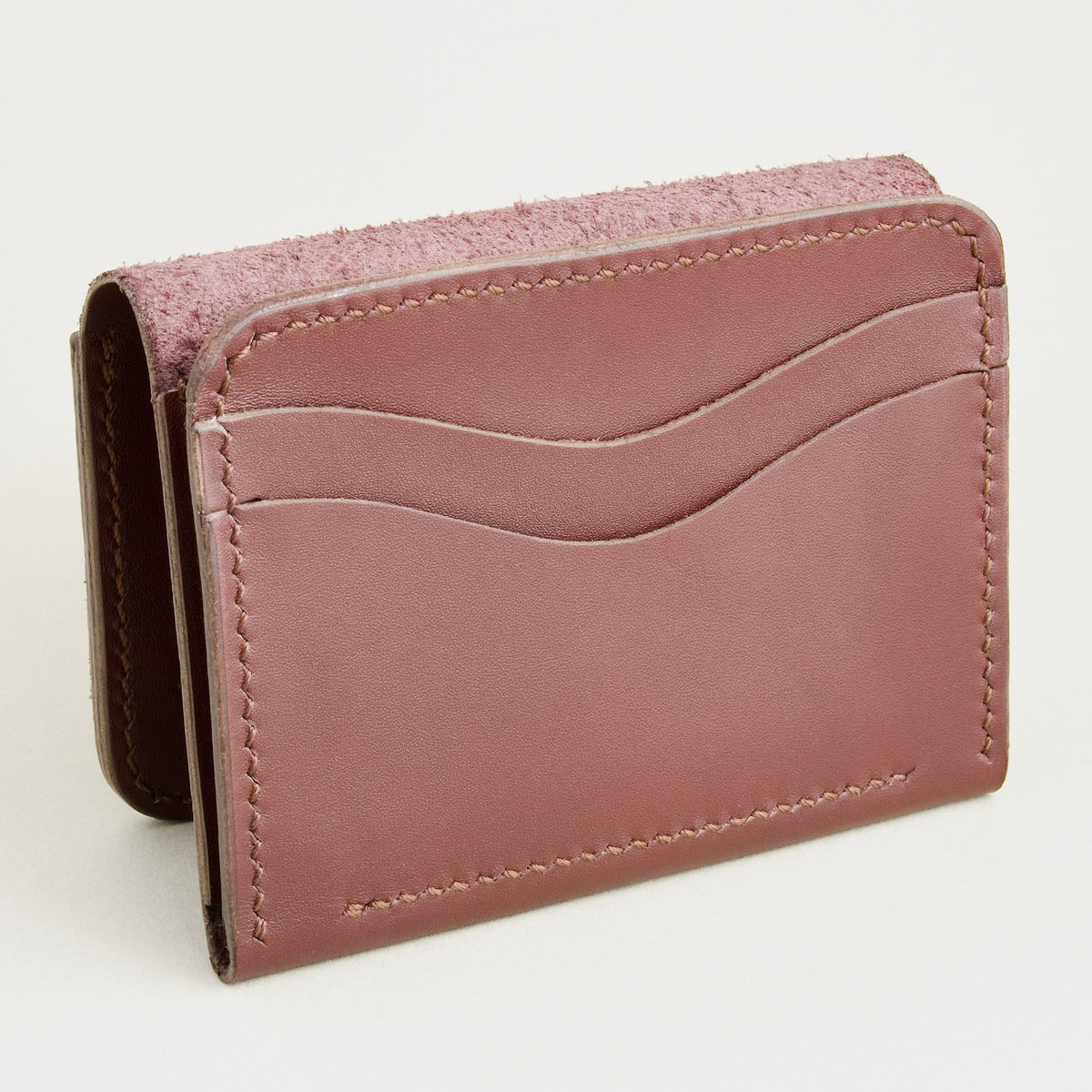 Front inside view of espresso brown full-grain leather flap fold wallet featuring a flap closure, card slots and handmade stitching. Markore Khaas Andaz.