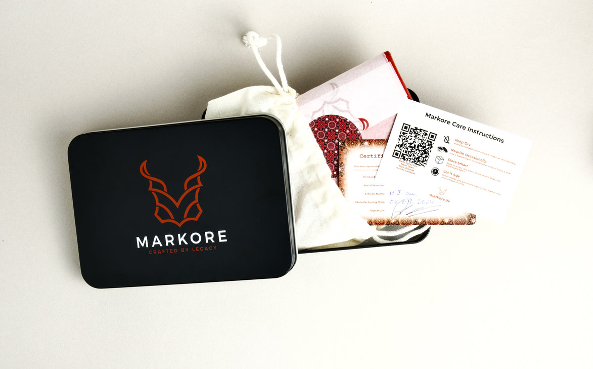 Black Markore box with branded packaging materials including certificate of authenticity