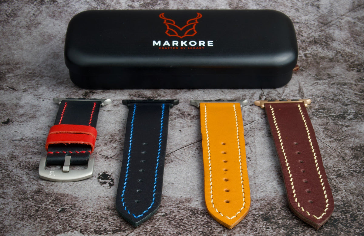 Set of markore hour line watch straps with a black tin case on a textured surface, featuring the Markore brand.